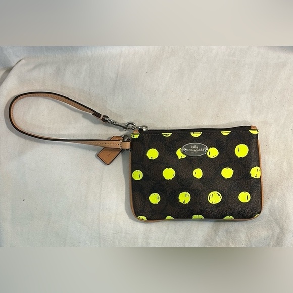 Coach Handbags - Coach Wristlet in Dot Print over Signature Canvas